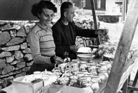 Anna Markova's mother and father sell glass and porcelain at the market