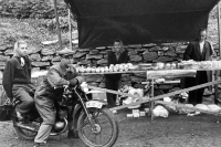 Anna Markova's mother and father sell glass and porcelain at the market