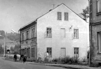 The house of Anna Marková and her parents in Vrbno pod Pradědem at the time when a railway siding was built behind the fields and the neighboring house was demolished