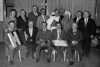 Erhard Pluške (standing, fourth left) with other Štěpánkovice men, all born in 1933, in the year of their 50th birthday, 1983