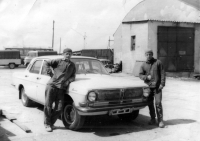 Erhard Pluške (left) on the premises of Mototechna which was refurbishing as a bricklayer