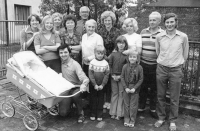 Jiří Tieftrunk with a pram during son Petr's christening