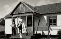 Typical wooden house, built by Czechs in Argentina, uncle Břetislav and Jaroslav Liška standing in front of the house, 1940s