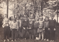 Miloš Lehečka (second from left below) and sister Marie (second from left above) in the kindergarten in Hradiště