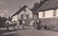 Daddy Antonín Lehečka with son Miloš Lehečka and daughter Marie (first from the right on the bike)