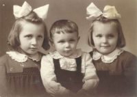 With siblings, left to right: Jana, Karel, Jaroslava, 1954