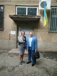 Volodymyr Kondur and Yulia Lisova captured before a court hearing on a lawsuit filed by Roma families affected by the pogroms in the Loshchynivka village. Odesa, 2017