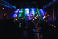 Performance of Dragon's Brew band, Jiří Vyšohlíd Sr. (left), Jiří Vyšohlíd Jr. (second from right), 2023, Prague