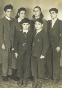 The Kostovský family. Witness second row, second from the right, 1948 - 1949