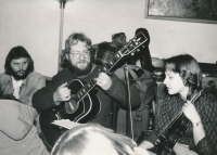 Karel Navratil (with the guitar) performing with Karma