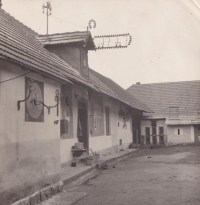 Antonín Lehečka's smithy with a sign about working hours "from seven to seven"