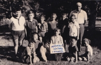 Miloš Lehečka (left by the sign) and other Hradiště friends in the circle where they grew trees