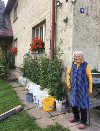 Miloslava Knobová with her abundant tomato crop in August 2025