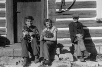 Miloslava Linková with her friend Olga Škodová and her father Josef Link in front of their house in Kotelsko, probably summer 1951