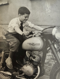 Marián Kvarda on a motorcycle at the age of six (1954)
