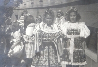 Věra Horáková in a folk costume at right