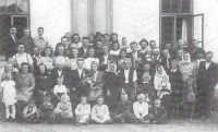 Ludmila's brother Josef's wedding (1946). Ludmila is on the bottom left in a white dress. Top left is Alois Pohůnek - a relative who was later beaten to death as part of the Světlana action