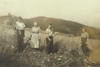 Working the field. With her father, her sister and a temporary worker from Prague
