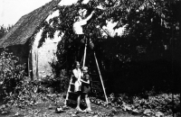 With sister and grandfather, Velký Trebešov, about 1964