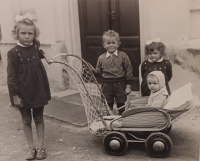 Drahomíra Šebestová (standing on the right) with her three siblings; 1950s