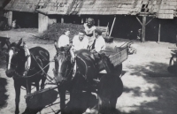 At home in the backyard as a child