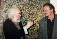 Petr Pavlík with Martin Zálešák in front of his painting Sláma