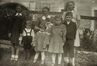 Lausecker children - from left Anna, August, witness Jana Voráčková, Veronika with her mother, Marie, František and Emma, 1948