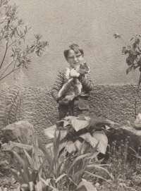 With a cat named IRIC at the family house in Mohelnice, about 1972