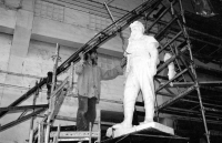 This image is from a series of photographs documenting the creation of a new statue of Milan Rastislav Štefánik. The original from Bohumil Kafka's sculpture studio was destroyed by the communist regime in Bratislava in 1953. The creation of the copy was led by Gotthard Janda