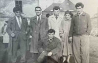 Husband Tanasis Niku (below) with friends