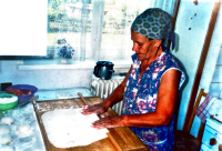 Vasiliki Niku making pita bread, 1990s