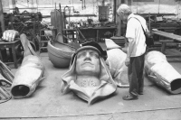 The photo is from a series of photographs documenting the creation of a new statue of Milan Rastislav Štefánik. The original from Bohumil Kafka's sculpture studio was destroyed by the communist regime in Bratislava in 1953. The creation of the copy was led by Gotthard Janda