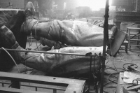 The photo is from a series of photographs documenting the creation of a new statue of Milan Rastislav Štefánik. The original from Bohumil Kafka's sculpture studio was destroyed by the communist regime in Bratislava in 1953. The creation of the copy was led by Gotthard Janda