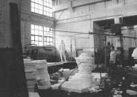 The photo is from a series of photographs documenting the creation of a new statue of Milan Rastislav Štefánik. The original from Bohumil Kafka's sculpture studio was destroyed by the communist regime in Bratislava in 1953. The creation of the copy was led by Gotthard Janda
