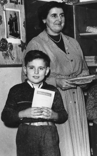 Miloslav Čejka, eleven years old, with his teacher Kodešová, who came to warn his parents, 1958