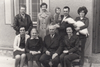 Family photo. Top row L to R: brother-in-law Čestmír Vach, niece Zdeňka Vachová, nephew Jiří, brother Jiří, sister-in-law Dana, niece Hana. Bottom row L to R: Zdeňka, mother Ludmila, father Adolf, sister Dana, latter 1980s