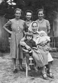 Witness (bottom left) with her grandmother, brother, mother (top right) and aunts Věra and Anna, 1940s