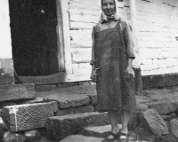 Kateřina Rudišová in front of her house in Prachov, 1940s
