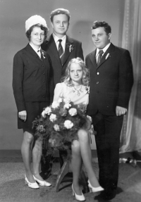 Zdeňka Pivrncová with her husband (left) in her brother-in-law Augustin's wedding photograph, 1960s