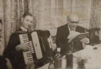 Father playing the accordion, 1980s