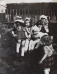 Maternal grandmother Anna Pilařová from Křižanovice, nee Chvojková, born 1894, with grandchildren: Vlasta Smetánková on the right, year 1952, Šiškovice