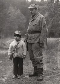 With grandfather at the People's Militia training