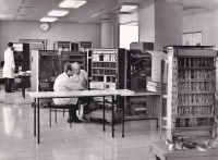 Vladimir Kotland sitting on the left, production of TESLA 200 computer, 1972