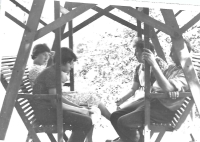 On a swing with mother and sister, undated, circa 1960