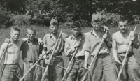 Josef Prejda (far left) making hay with a scythe in Slovakia during his military service, 1956