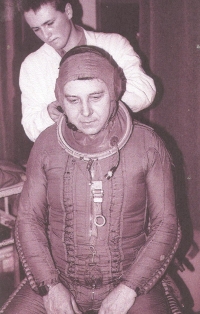 Jiří Ovísek putting on his high-altitude gear