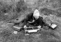 Karel Honzík, a member of the listening expedition, tunes the top radio receiver Grundig Satelit, Rügen, late 70s/early 1980s 