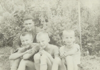 Three Horák brothers with a pilot