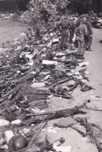 Americans disarm German soldiers at Ptáčkovna near Písek, May 1945.