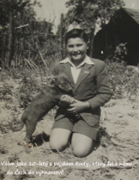 Viliam at home in the yard with puppy Rinty